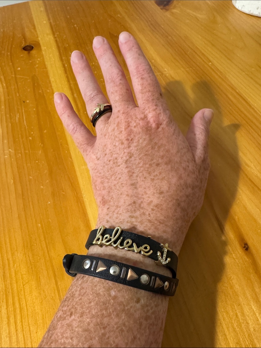 Black 'Believe' Bracelet with Studded Accents